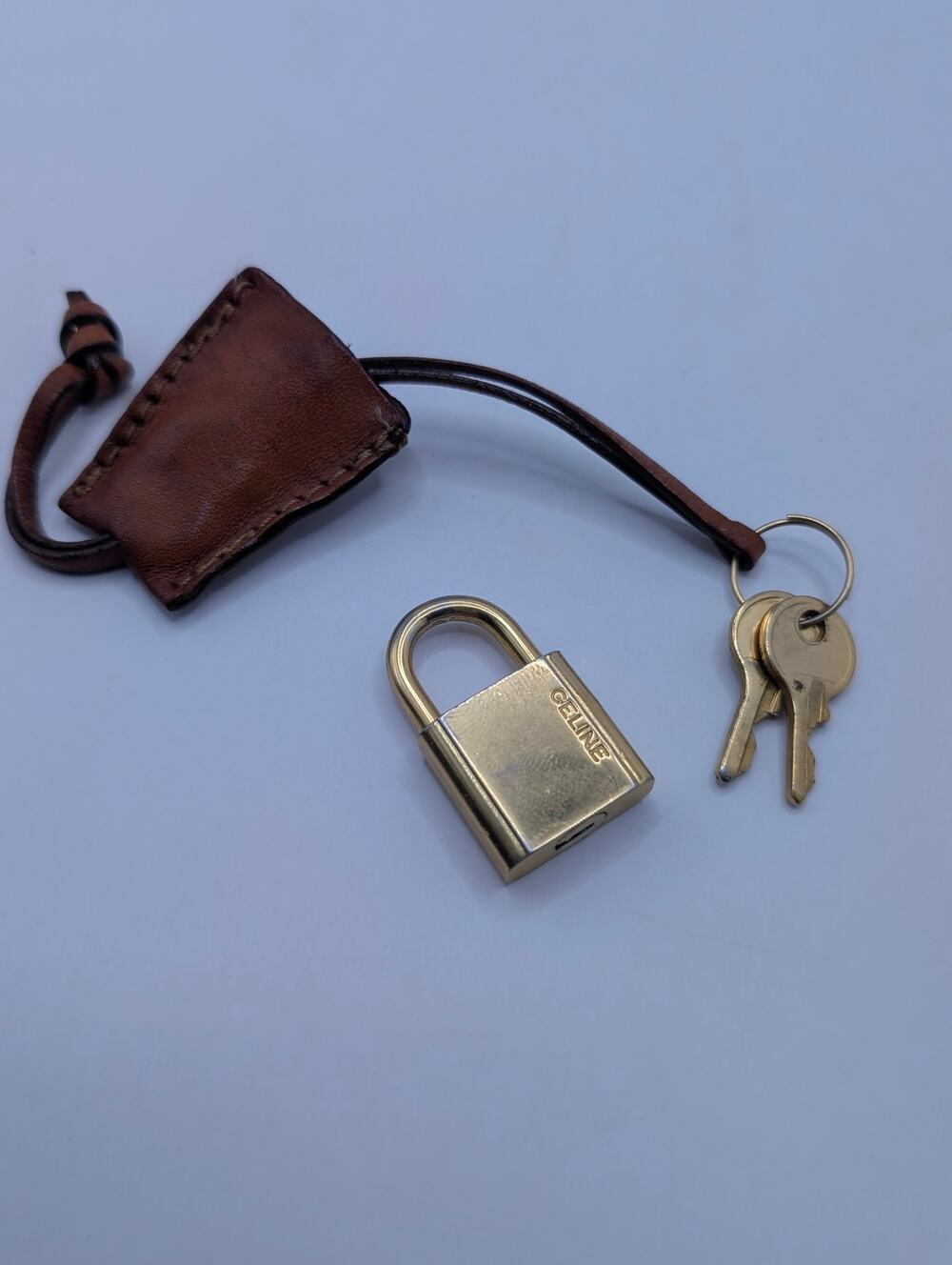 Authentic Celine Gold Padlock and Key Set with Leather Sheath